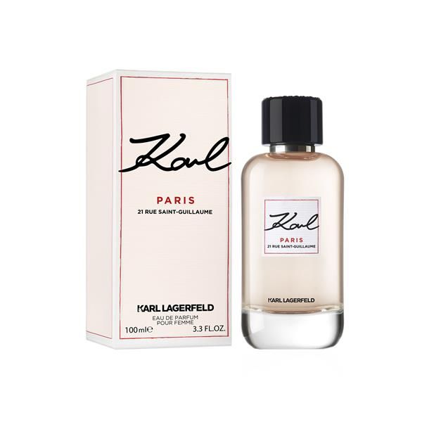 Karl Lagerfeld Paris Eau de Parfum bottle next to its original packaging box, featuring a pale pink box with black and red lettering and a clear glass bottle with a black cap.